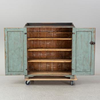 A mid 19th century painted cupboard.