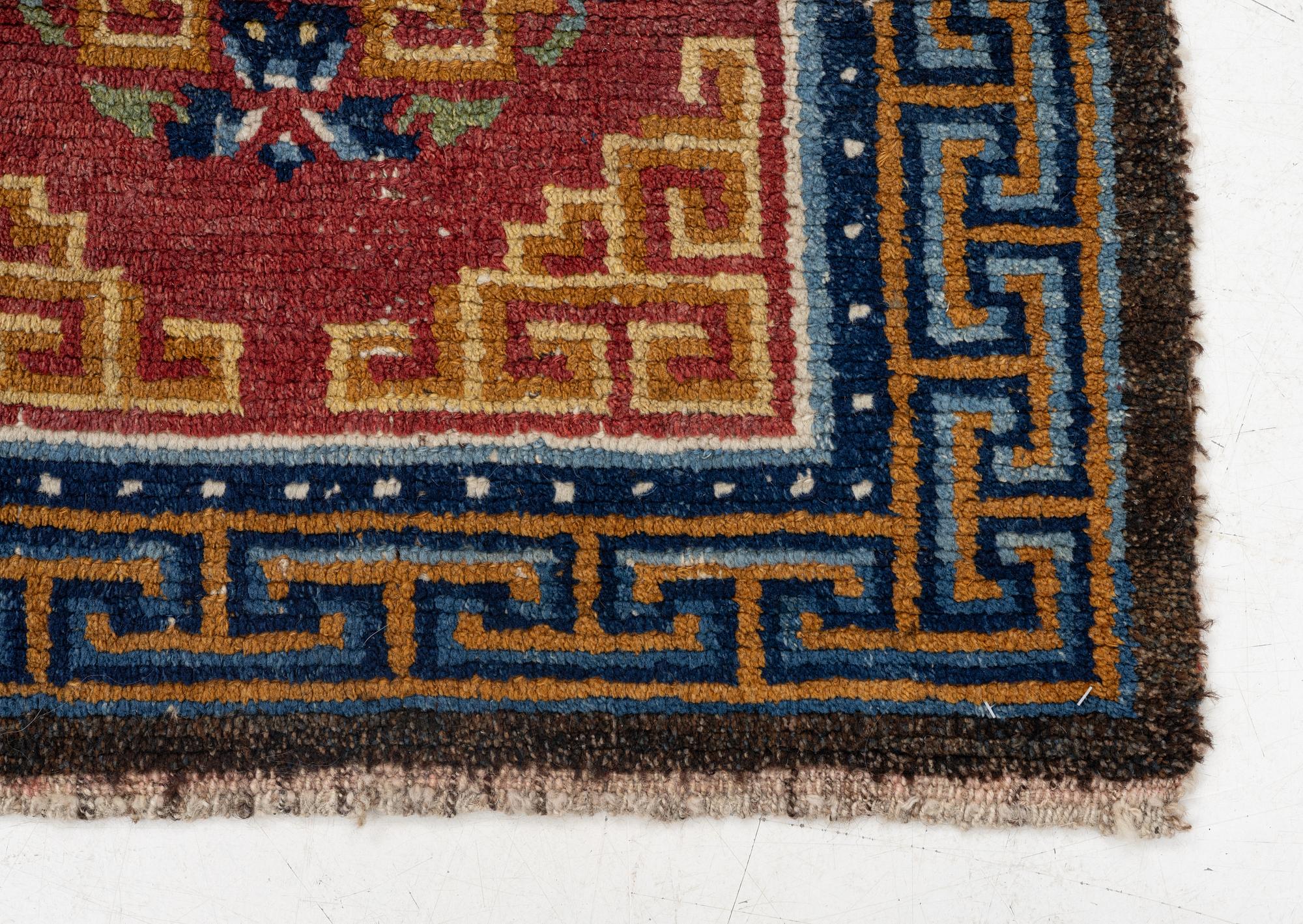 An antique Tibet 'Khaden' rug, c 135 x 70 cm.