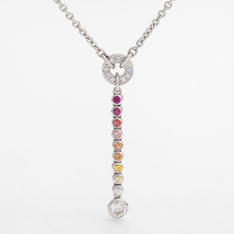 An 18K whitegold necklace with a diamond ca 1.01 ct, smaller diamonds tot. ca 0.15 ct, ruby and 
sapphires, Helsinki.