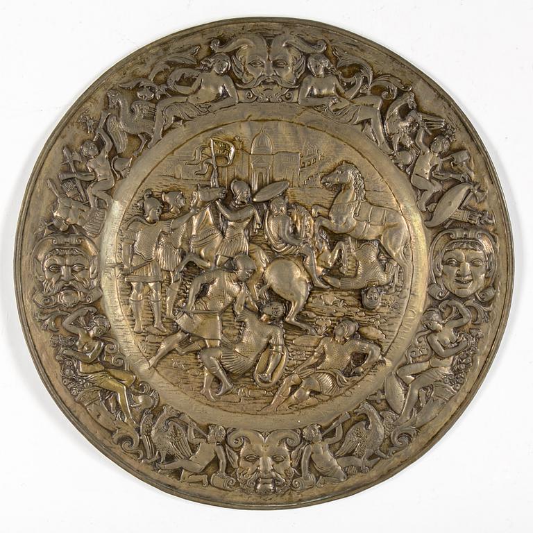 A BRASS WALL PLAQUE, 19th century.