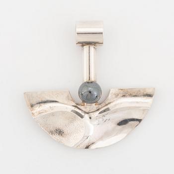 Rolf Karlsson a silver and hematite pendant.