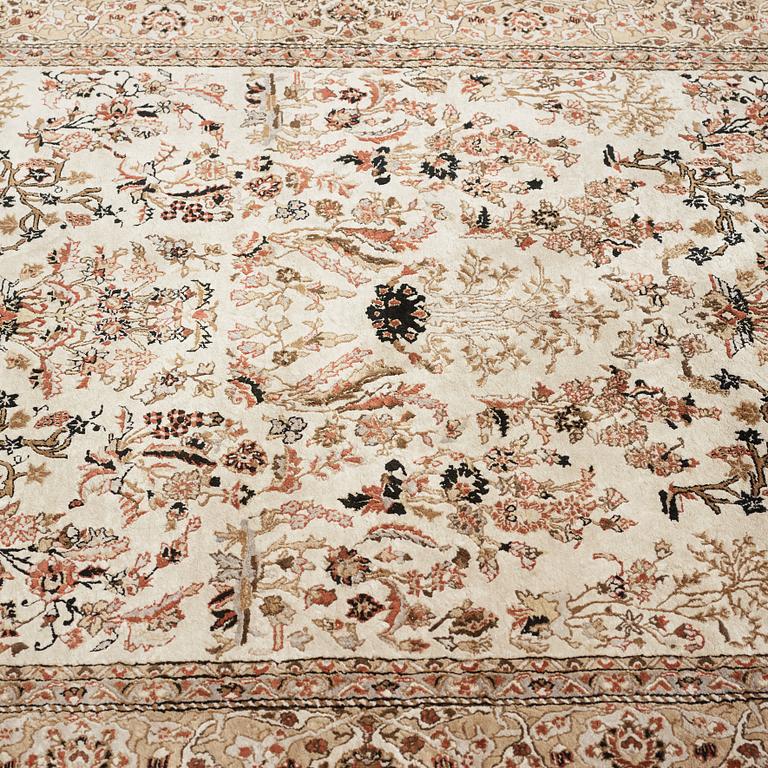 A chinese slik carpet, around 254 x 154 cm.