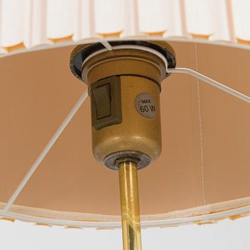 A pair of late 20th century floor lamps.