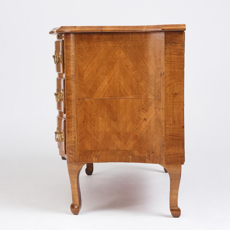 A late Baroque walnut-veneered chest of drawers attributed to J. H. Fürloh (master in Stockholm 1724-1745).