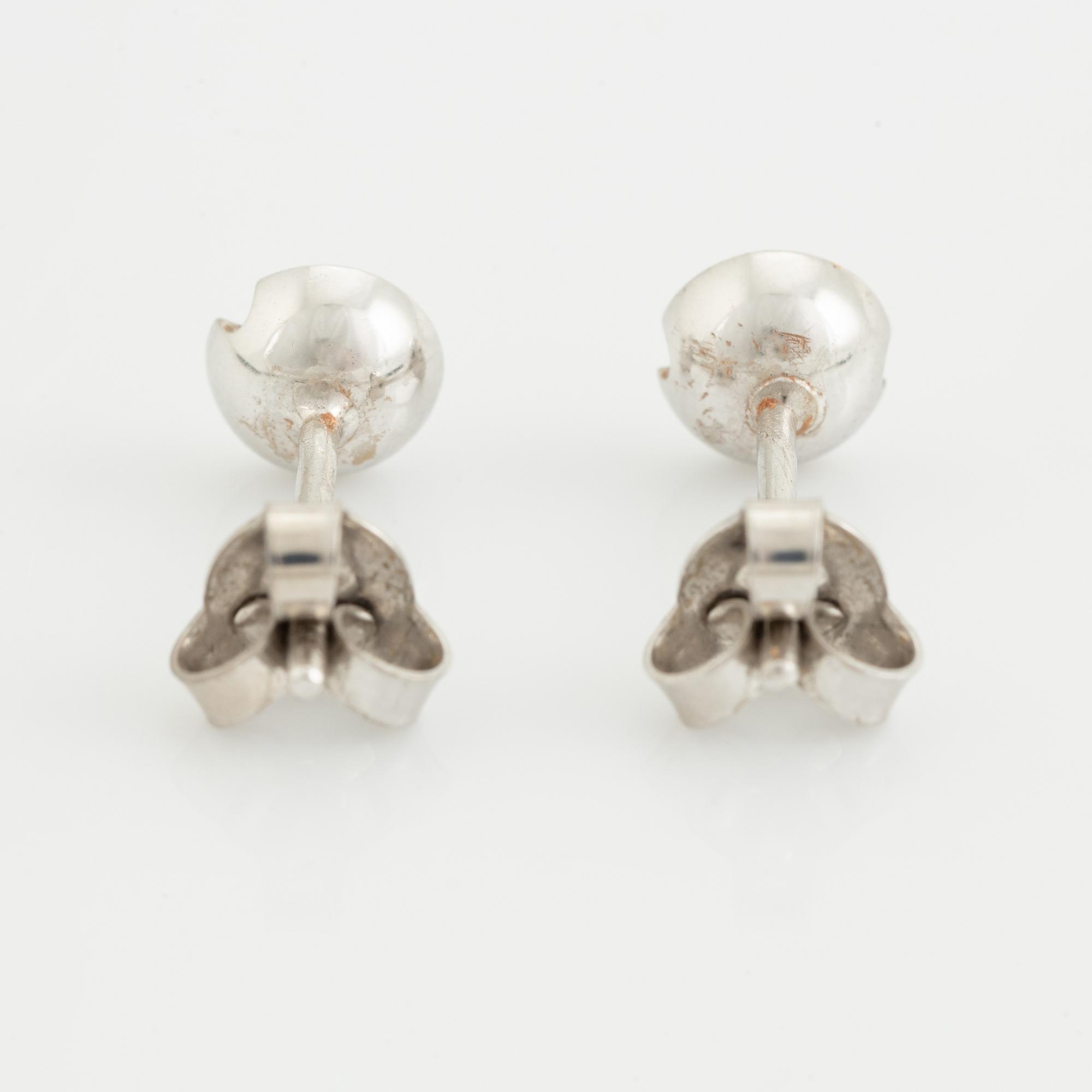 White gold and brilliant cut diamond earrings.