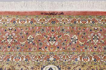 A silk Qum carpet, ca 295 x 195 cm.
