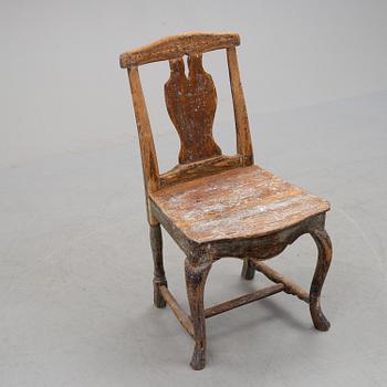 a 18th century wooden chair.