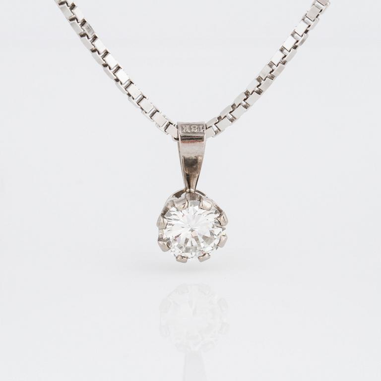 A brilliant cut diamond pendant.