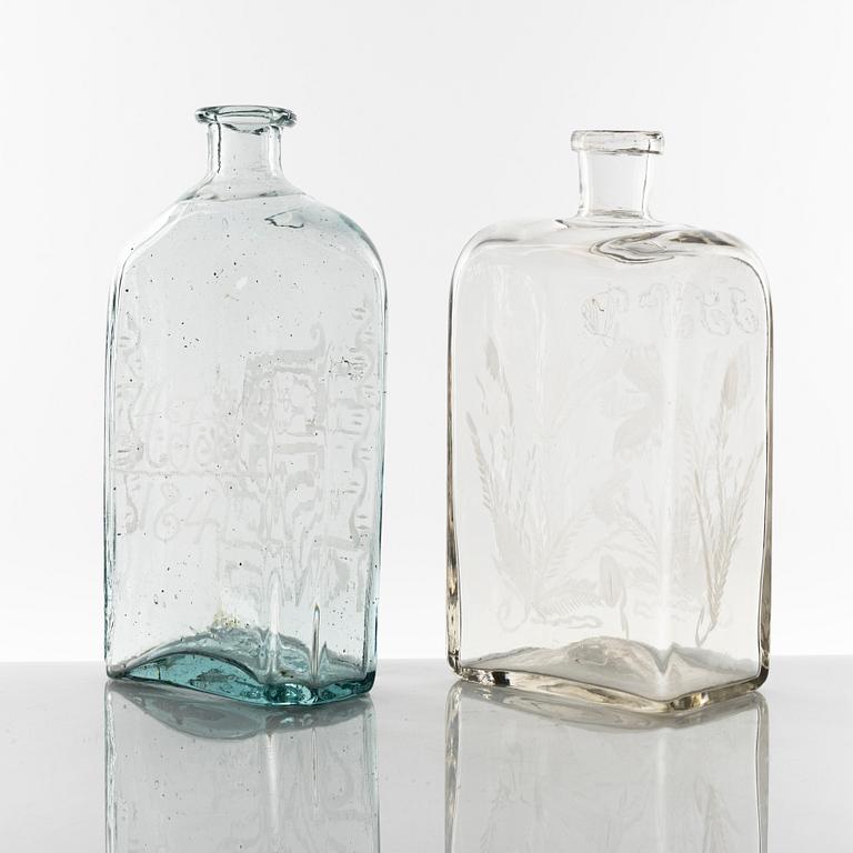 Two bottles of spirits, glass, 2 pcs, one dated 1841, according to information from northern Hälsingland.