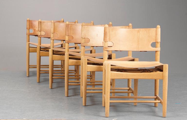 A Börge Mogensen dinner table by K Andesson & Söner and 10 chairs, oak, by Fredericia Funiture, Denmark.