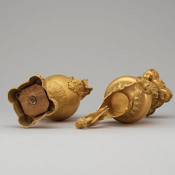 A pair of mid 19th century gilt bronze ornamental ewers.