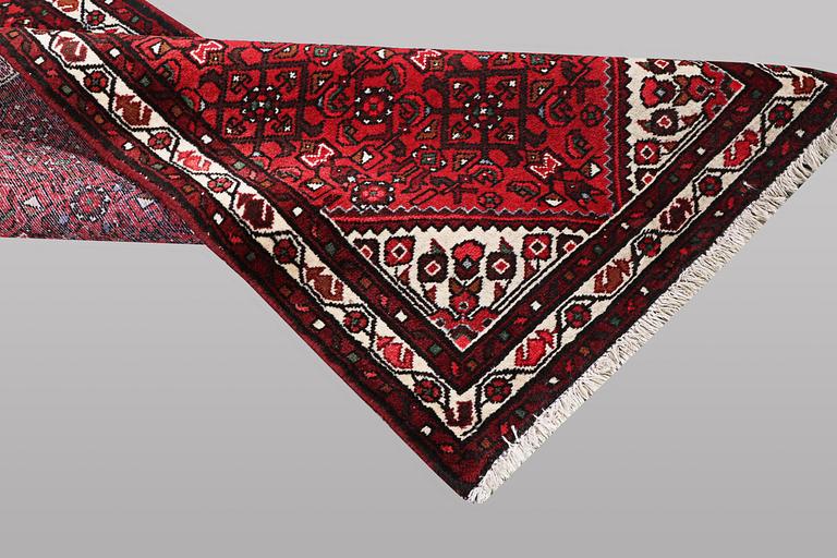 A runner carpet, Hosseinabad, ca 393 x 82 cm.
