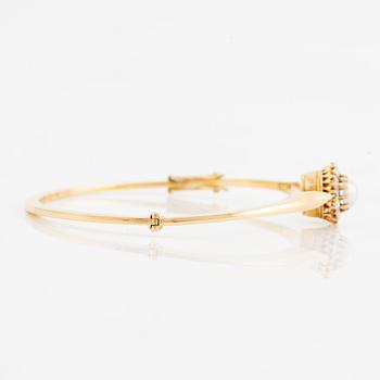 Bracelet in 18K gold with a half-pearl and rose-cut diamonds.