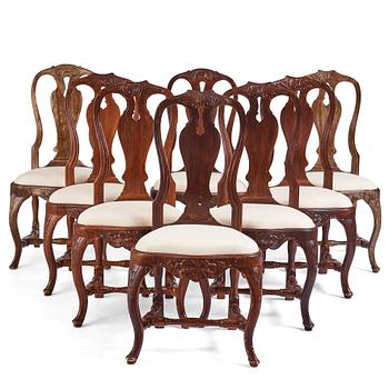 59. A set of eight matched (2+6) Swedish Rococo chairs, Stockholm, second part of the 18th century.