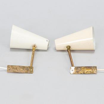 A pair of mid-20th century wall lamps.