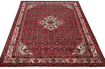A Hosseinabad carpet, c. 310 x 210 cm.