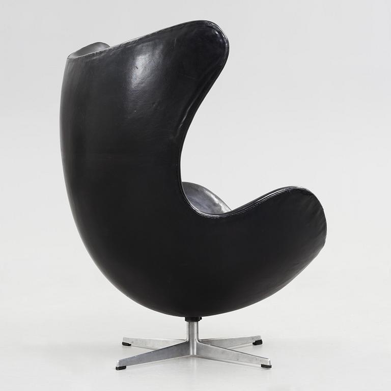 An Arne Jacobsen black leather 'Egg' chair, Fritz Hansen, Denmark 1960's.