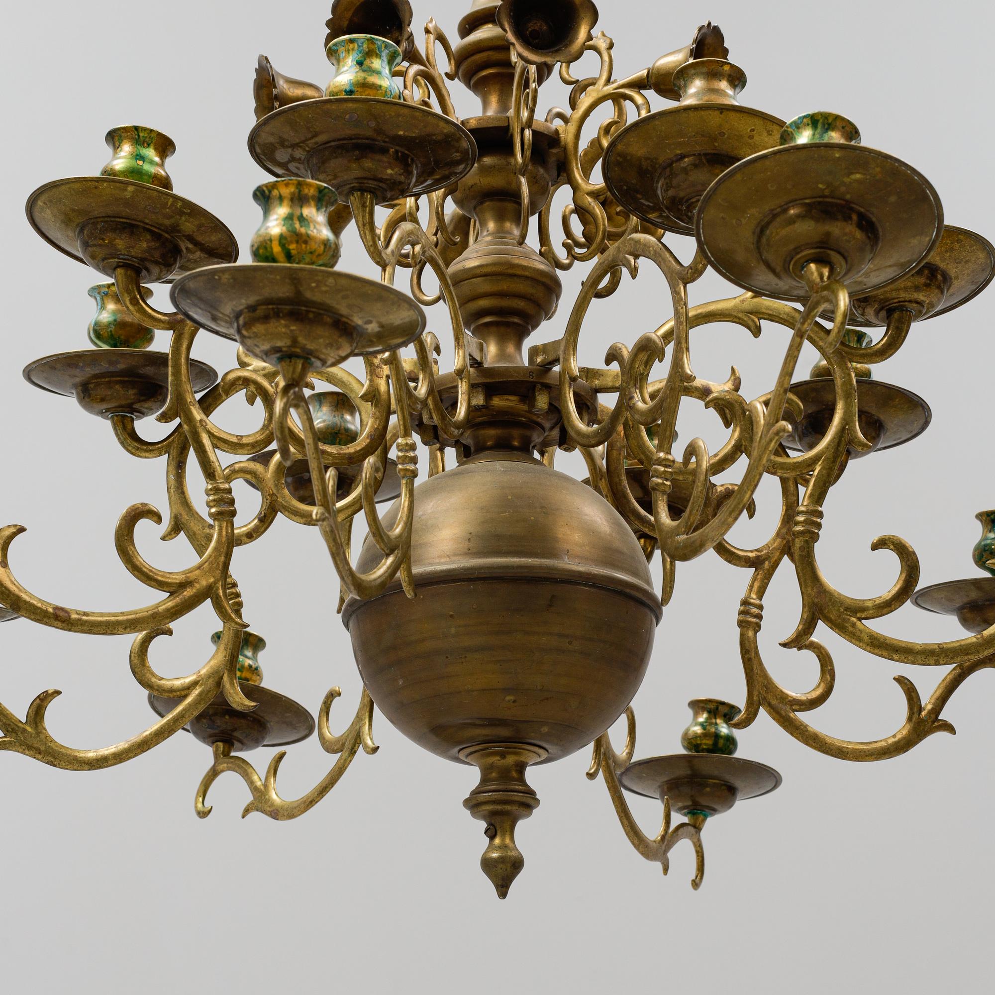 A brass Baroque style chandelier. 20th Century.
