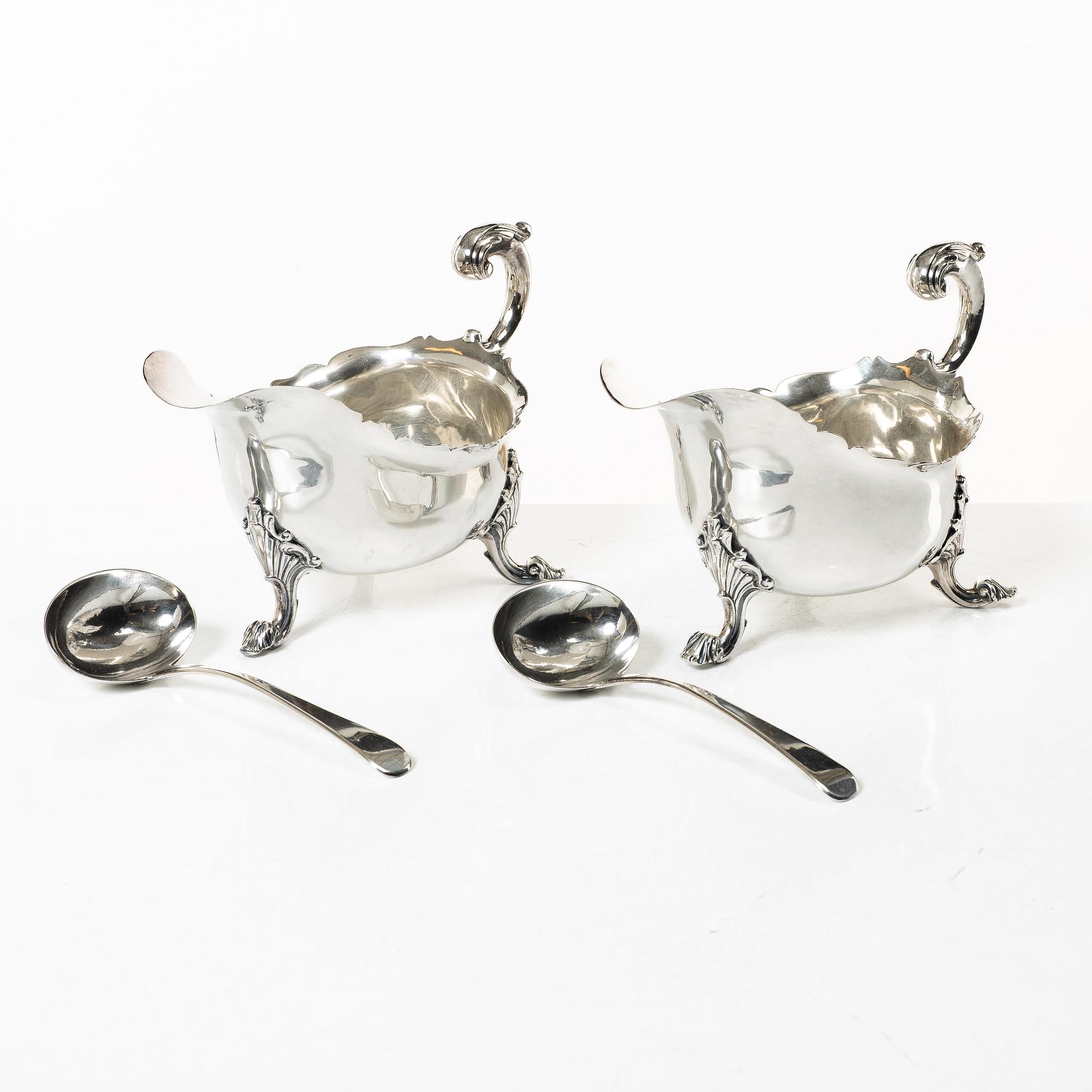 A pair of 18th century silver sauce boats, Richard William, Ireland, spoons, Peter & William Bateman, London 1807.