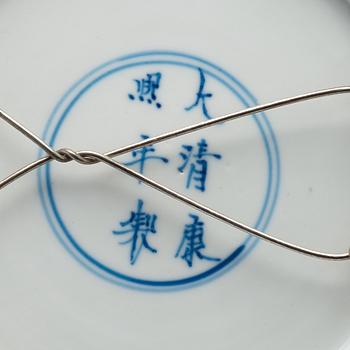 Two blue and white dishes, Qing dynasty, Kangxi mark and period (1662-1722).