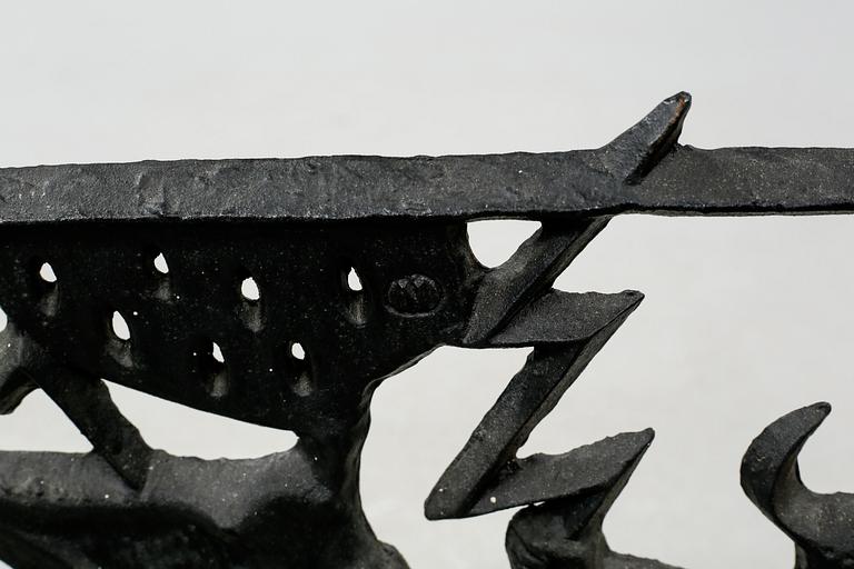 1960s cast iron spark protection by Olle Hermansson.