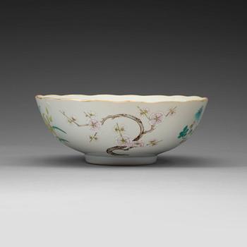 A famille rose bowl, late Qing dynasty, with Daoguangs sealmark in red.