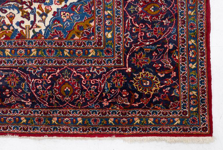 An Oriental carpet, c. 396 x 300 cm.