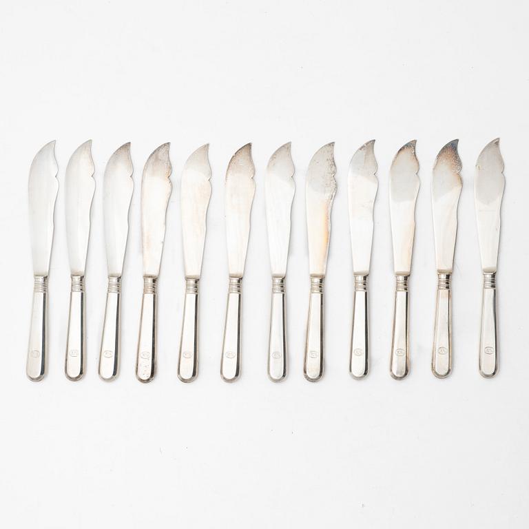 A Russian silver cutlery set, including mark of Ovchinnikov with the Imperial warrant, St Petersburg 1908-16 (24 pieces).