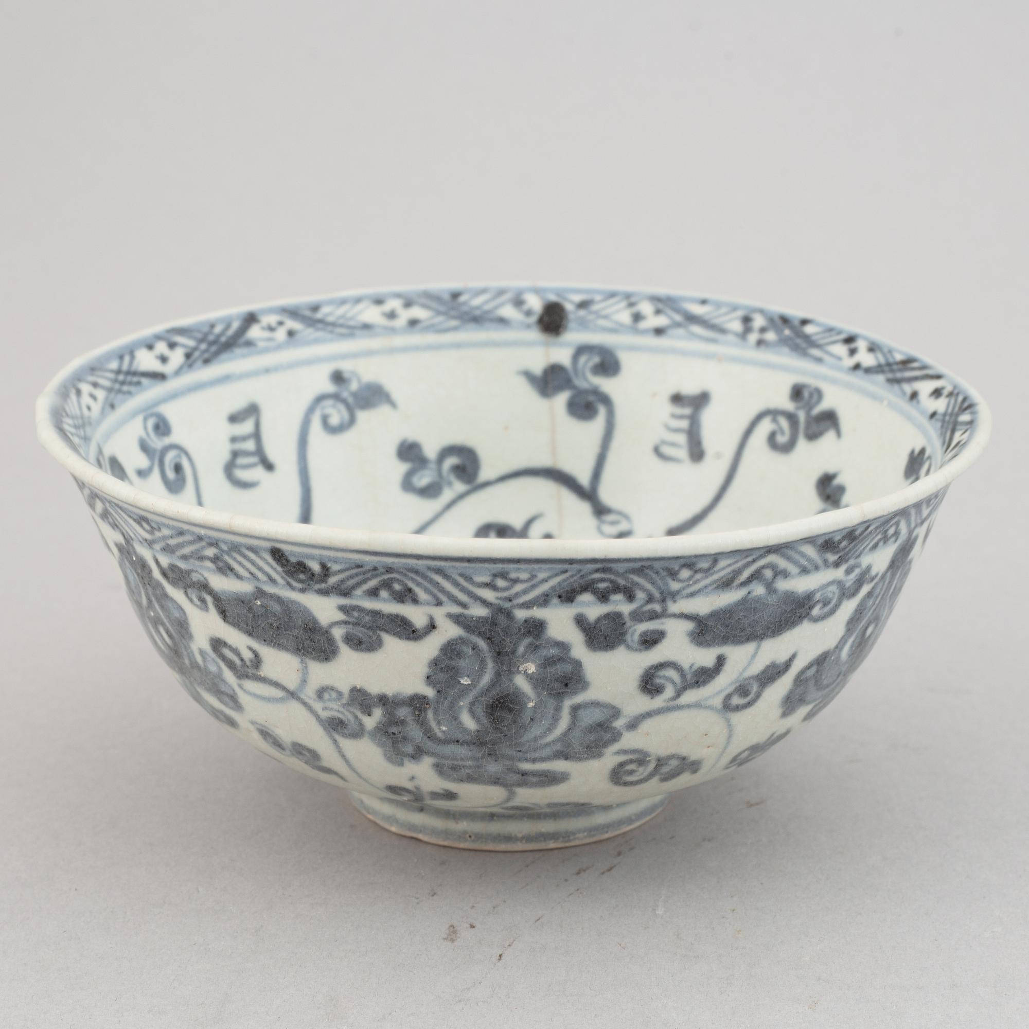 A group of four blue and white bowls, Ming dynasty (1368-1644).