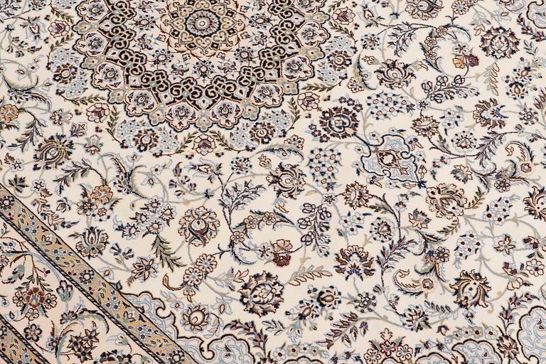 A carpet, Nain part silk so called 6 LAA, signed, ca 240 x 137 cm.