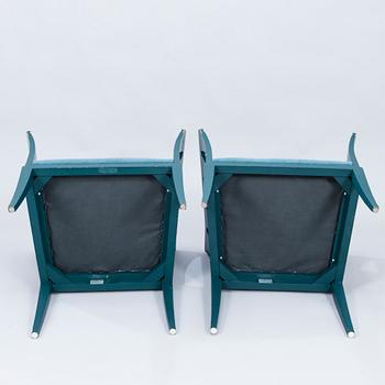 A pair of "Blue Chair" armchairs by Eliel Saarinen, Adelta, Finland 1983.