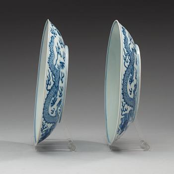 A pair of blue and white 'Dragon dishes', Qing dynasty, Daoguang seal mark and period (1821-50).