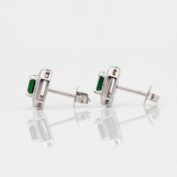 A pair of Asscher-cut tsavorite and brilliant-cut diamond earrings.