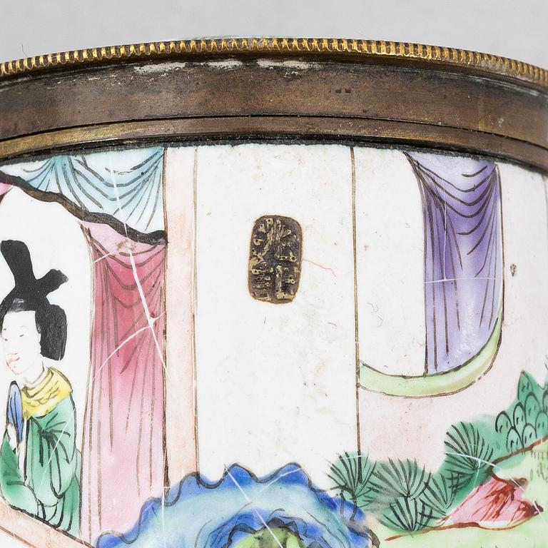 A group of Chinese enamels, including a flower pot, a box and four cups, Qing dynasty, 18th and 19th century.