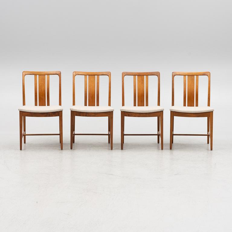 Four walnut chairs, AB Linde Nilsson, Lammhult, Sweden, second half of the 20th century.