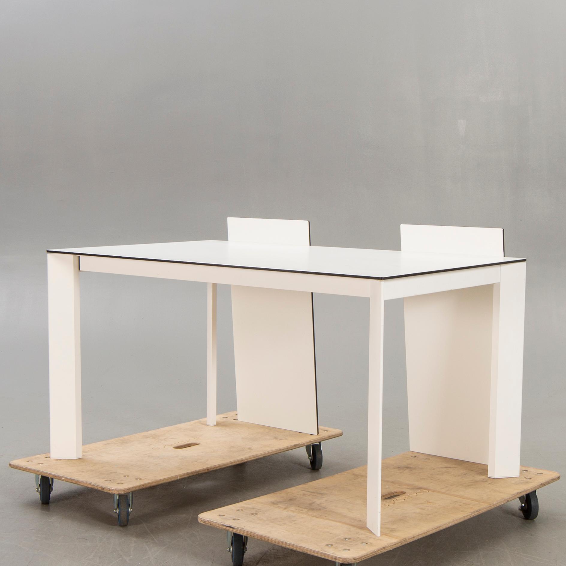 Caronni & Bonanomi, a "Every + Grid" dining table for Desalto 21st century.