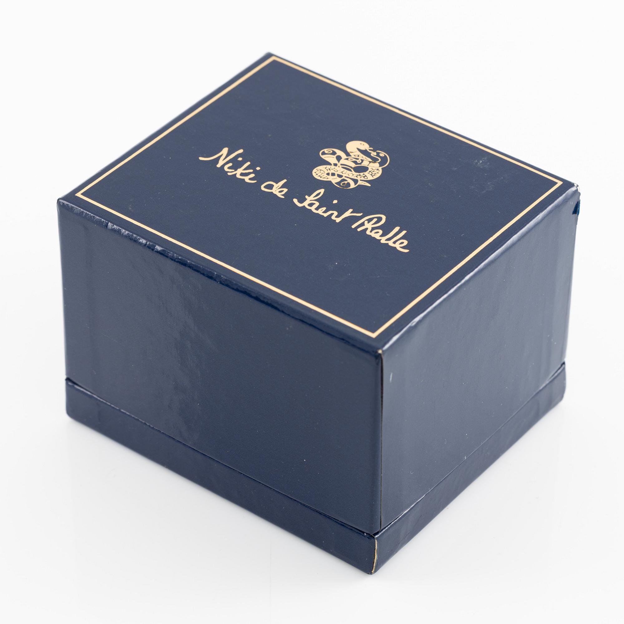 Niki de Saint Phalle ormarmband gul metall med emalj.