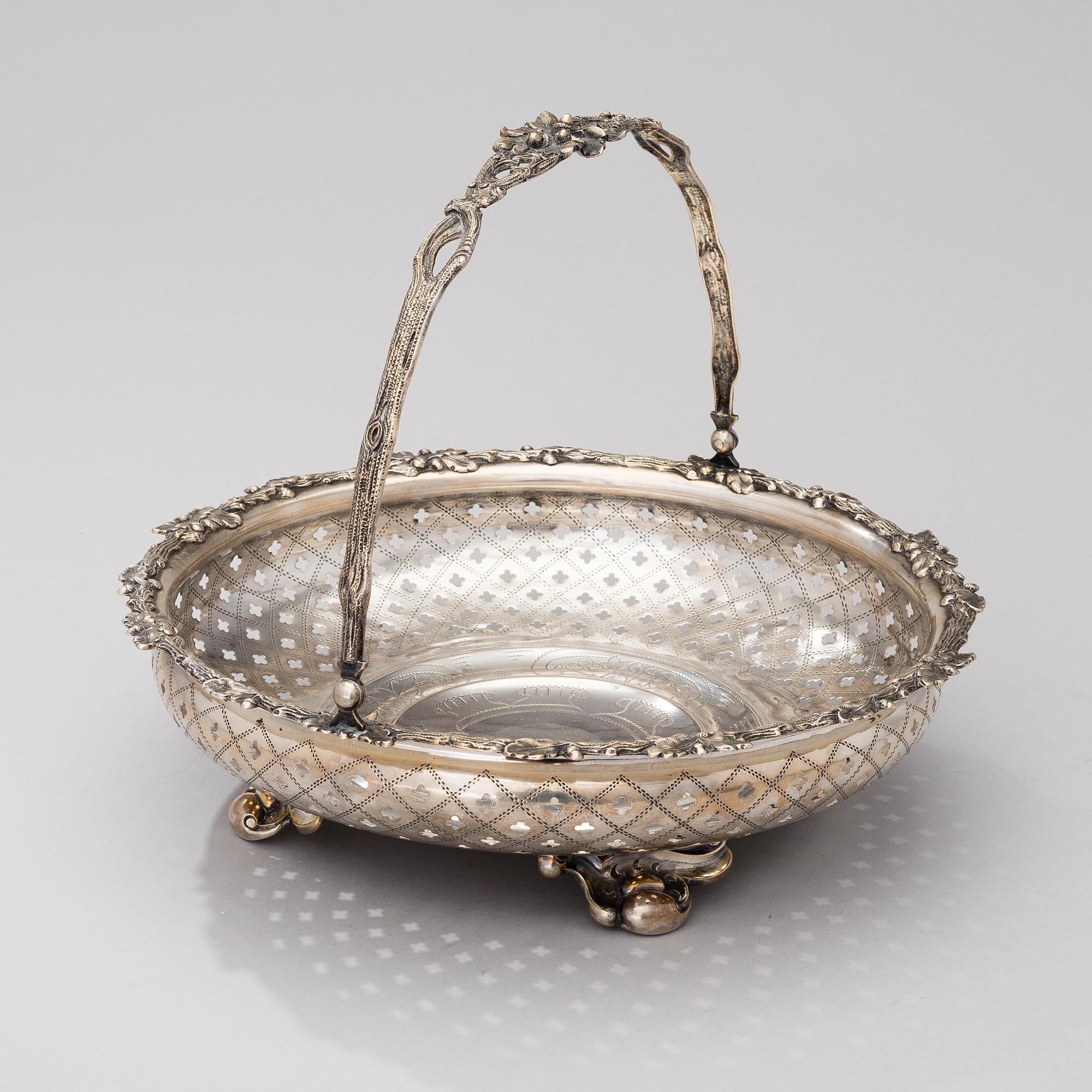 A SILVER SWING HANDLE BASKET, Germany late 19th century, controll marks Soviet Union, 20th century, weight 694 g.
