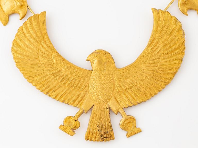 A modern Egyptian-style gold necklace.