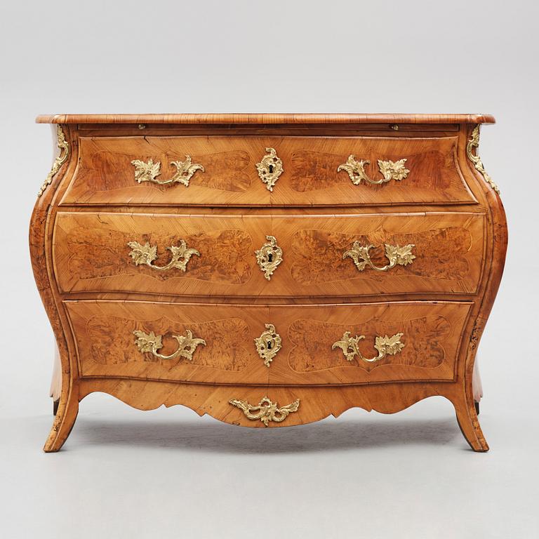 A burr-alder and gilt brass-mounted rococo commode by J. Sjölin (master 1767-85).