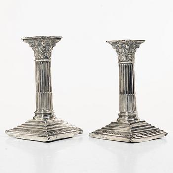 A pair of English silver column candlesticks, mark of Walter Latham & Son, Sheffield, 1910.