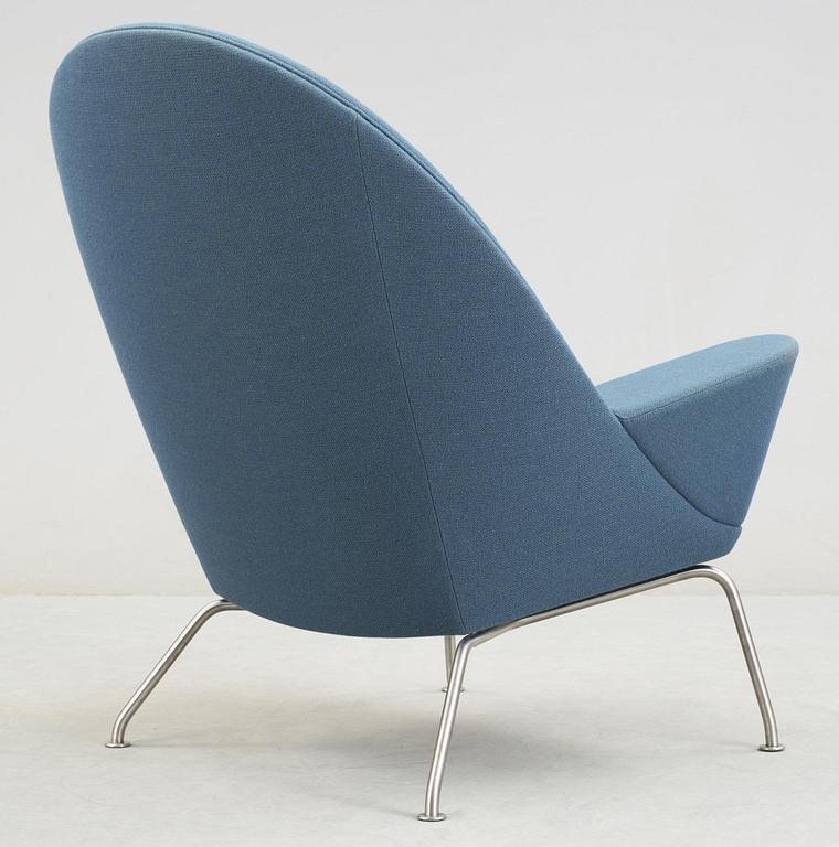 A Hans Wegner 'CH468' armchair, blue fabric, steel legs, Carl Hansen & Søn, Denmark.