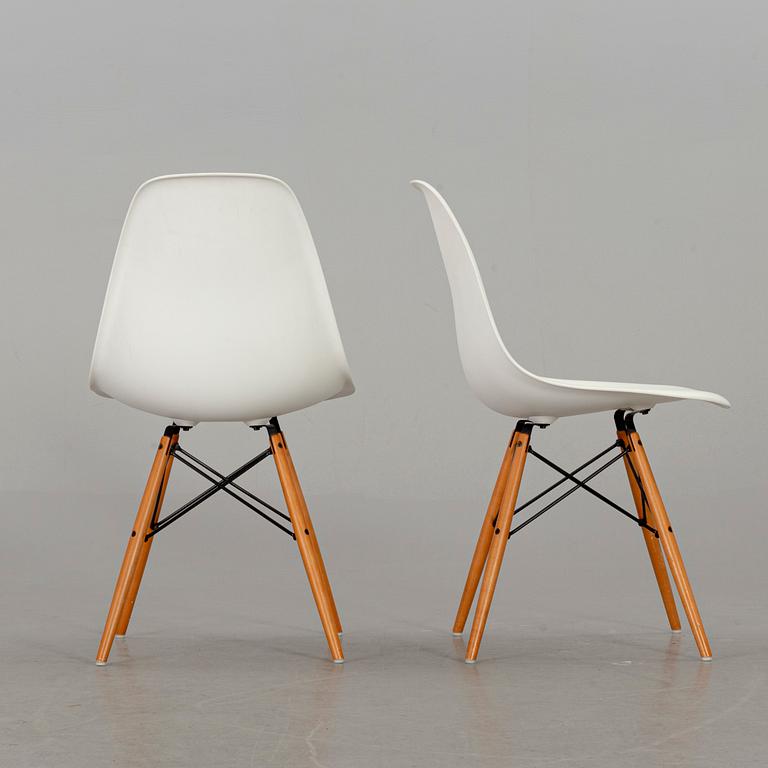 A PAIR OF "PLASTIC CHAIR" BY CHARLES & RAY EAMES, Vitra 2009.