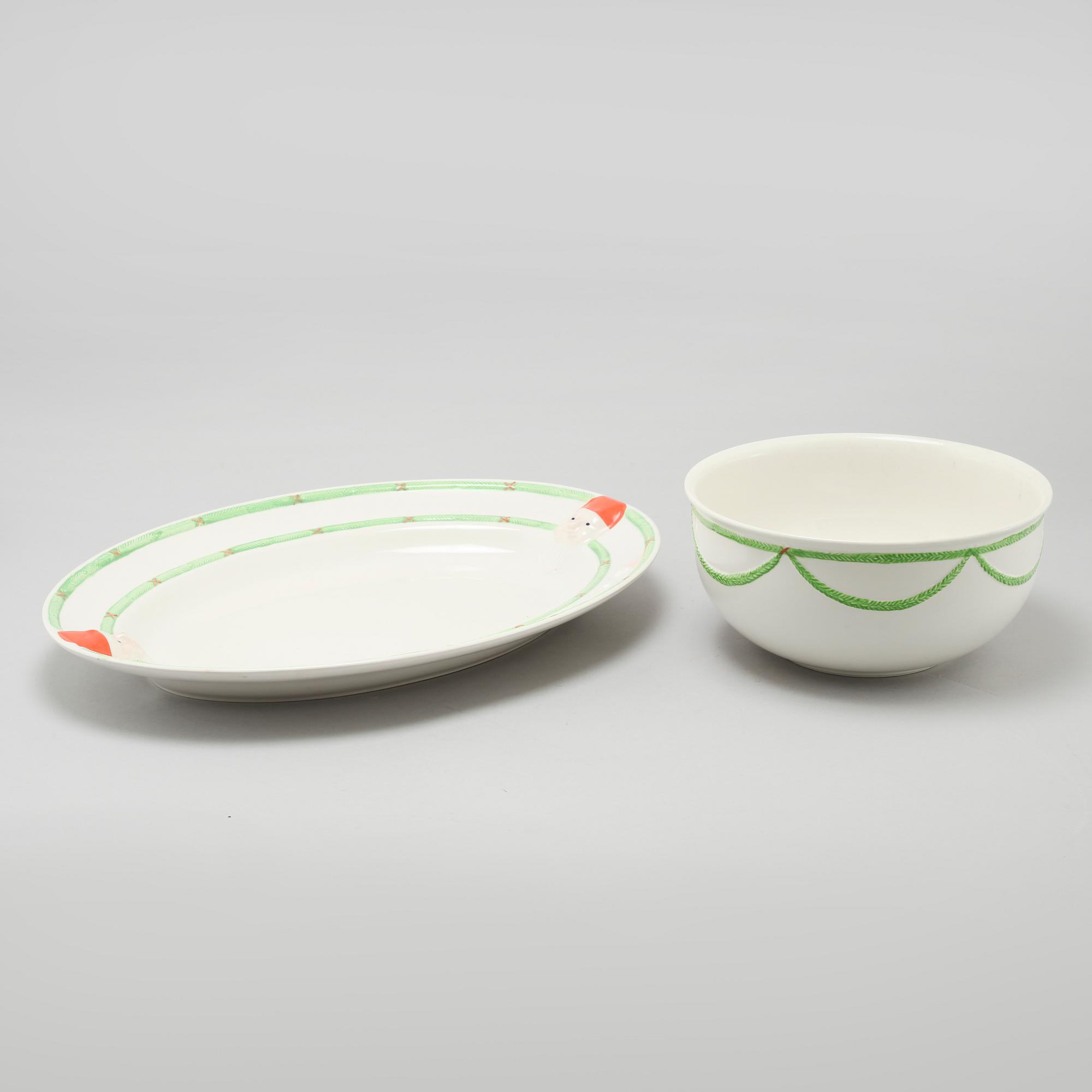 A 20th century set of earthenware tableware of 21 pcs by Gustavsberg.
