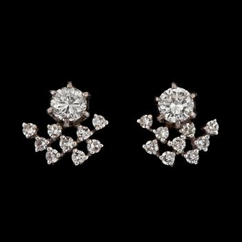 889. A pair of brilliant-cut diamond earrings.