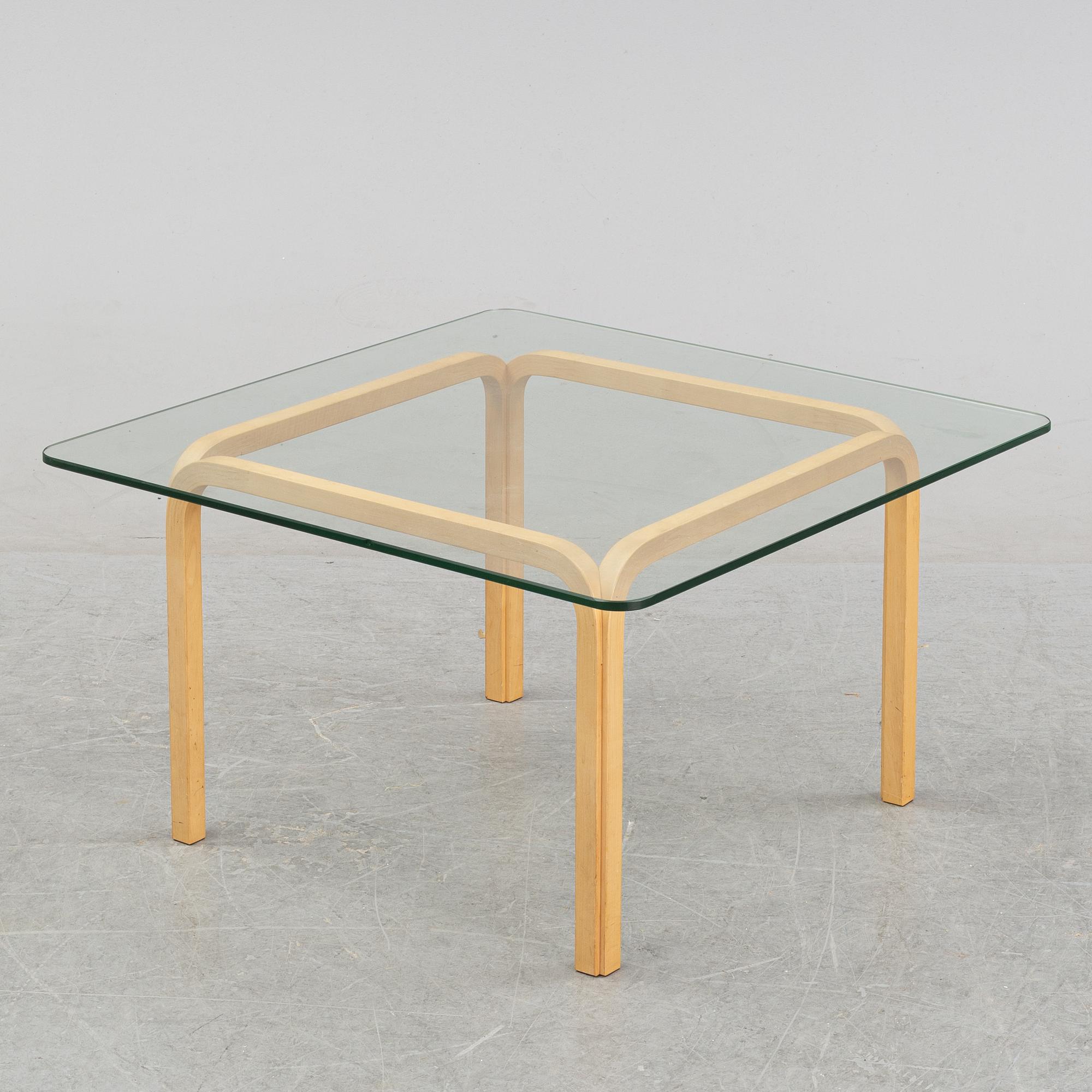 A model Y 805 glass and birch coffee table by Alvar Aalto, second half of  the 20th Century.