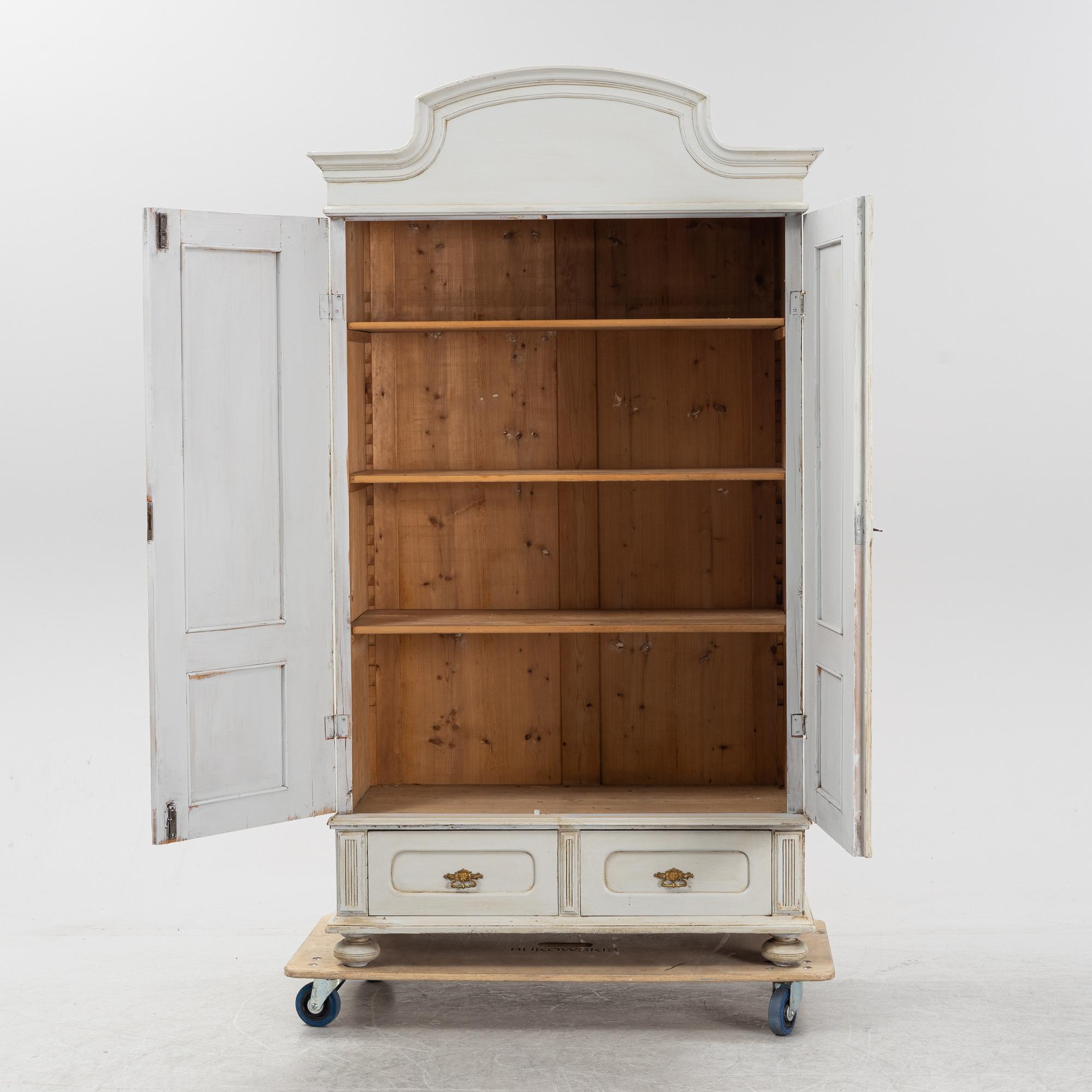 An Art Nouveau clothes cabinet, around 1900.