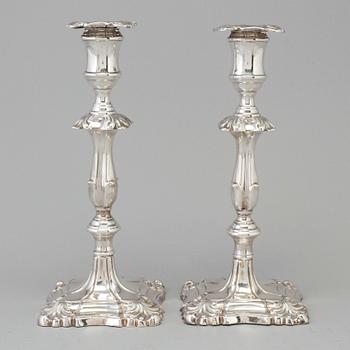 A pair of silver candle sticks by Martin, Hall & Co. London 1889.