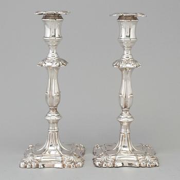 A pair of silver candle sticks by Martin, Hall & Co. London 1889.