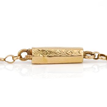 KEDJA, omkring sekelskiftet 1900-talets. 18K guld.